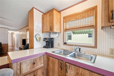 Pack your bags and come spend the winter or your retirement in on Betmar Acres Golf Club in Florida - for sale on GolfHomes.com, golf home, golf lot
