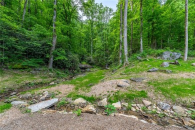 Private Mountain Retreat with Waterfall on 3.4 Acres. Discover on The Cliffs at Glassy Golf and Country Club in South Carolina - for sale on GolfHomes.com, golf home, golf lot