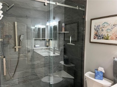 Please take a look at this totally renovated Brookside condo on Naples Heritage Golf and Country Club in Florida - for sale on GolfHomes.com, golf home, golf lot