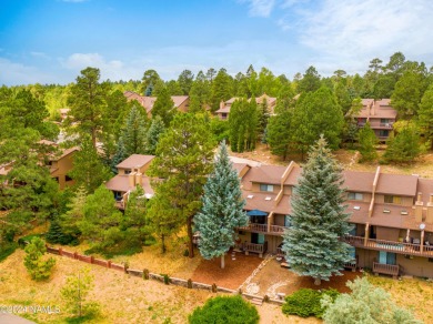 Stunning end-unit townhome located on the Aspen Golf Course on Aspen Valley Golf Club in Arizona - for sale on GolfHomes.com, golf home, golf lot