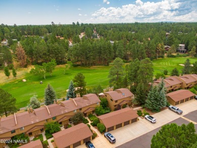 Stunning end-unit townhome located on the Aspen Golf Course on Aspen Valley Golf Club in Arizona - for sale on GolfHomes.com, golf home, golf lot