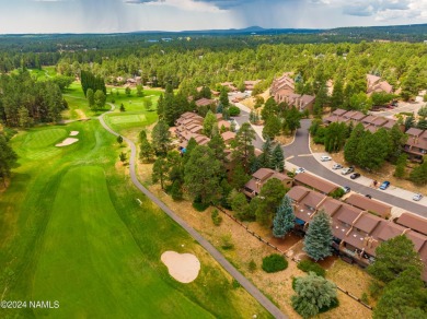 Stunning end-unit townhome located on the Aspen Golf Course on Aspen Valley Golf Club in Arizona - for sale on GolfHomes.com, golf home, golf lot