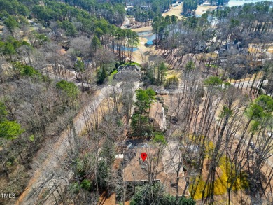 STUNNING views of MacGregor Downs Golf Course - IMMACULATE and on MacGregor Downs Country Club in North Carolina - for sale on GolfHomes.com, golf home, golf lot