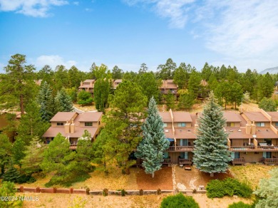 Stunning end-unit townhome located on the Aspen Golf Course on Aspen Valley Golf Club in Arizona - for sale on GolfHomes.com, golf home, golf lot