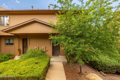 Stunning end-unit townhome located on the Aspen Golf Course on Aspen Valley Golf Club in Arizona - for sale on GolfHomes.com, golf home, golf lot