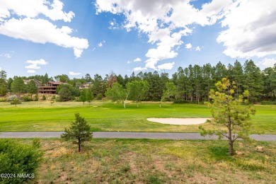 Stunning end-unit townhome located on the Aspen Golf Course on Aspen Valley Golf Club in Arizona - for sale on GolfHomes.com, golf home, golf lot