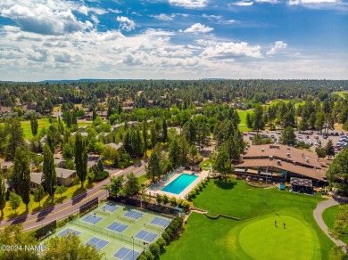 Stunning end-unit townhome located on the Aspen Golf Course on Aspen Valley Golf Club in Arizona - for sale on GolfHomes.com, golf home, golf lot