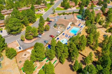 Stunning end-unit townhome located on the Aspen Golf Course on Aspen Valley Golf Club in Arizona - for sale on GolfHomes.com, golf home, golf lot