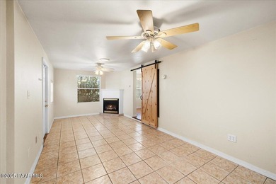 Tucked within the Villages at Lynx Creek, a vibrant 55+ on Quail Wood Greens Golf Course in Arizona - for sale on GolfHomes.com, golf home, golf lot