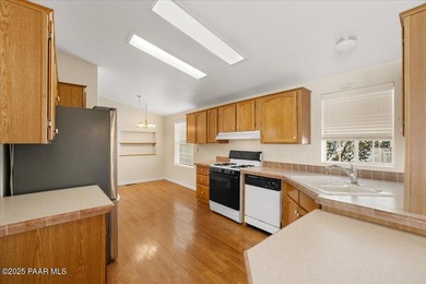 Tucked within the Villages at Lynx Creek, a vibrant 55+ on Quail Wood Greens Golf Course in Arizona - for sale on GolfHomes.com, golf home, golf lot