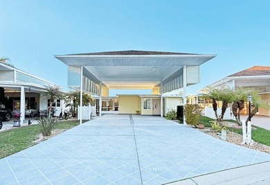 This RV port with an Executive Suite (447 sq.ft.)  is located in on The Great Outdoors Golf and Country Club in Florida - for sale on GolfHomes.com, golf home, golf lot
