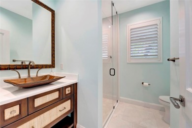 Beautifully renovated home in Orchid Island overlooking the 11th on Orchid Island Golf and Beach Club in Florida - for sale on GolfHomes.com, golf home, golf lot