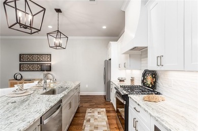 Experience the epitome of luxurious, age-targeted living at on Grand National Golf Course in Alabama - for sale on GolfHomes.com, golf home, golf lot