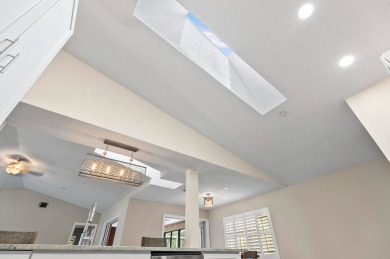 Welcome to your Florida dream home! This stunning 4-bedroom on The Grand Club - Pine Lakes Course in Florida - for sale on GolfHomes.com, golf home, golf lot