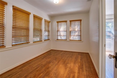 Step into this charming brick cottage and you'll be greeted by on Stevens Park Golf Course in Texas - for sale on GolfHomes.com, golf home, golf lot