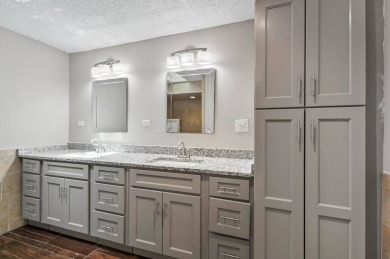 Welcome to your Florida dream home! This stunning 4-bedroom on The Grand Club - Pine Lakes Course in Florida - for sale on GolfHomes.com, golf home, golf lot