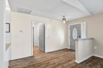 Welcome to your Florida dream home! This stunning 4-bedroom on The Grand Club - Pine Lakes Course in Florida - for sale on GolfHomes.com, golf home, golf lot