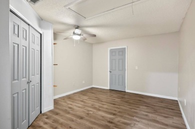 Welcome to your Florida dream home! This stunning 4-bedroom on The Grand Club - Pine Lakes Course in Florida - for sale on GolfHomes.com, golf home, golf lot