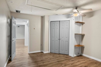 Welcome to your Florida dream home! This stunning 4-bedroom on The Grand Club - Pine Lakes Course in Florida - for sale on GolfHomes.com, golf home, golf lot