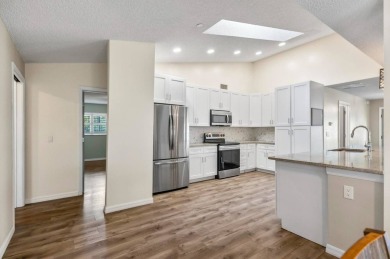 Welcome to your Florida dream home! This stunning 4-bedroom on The Grand Club - Pine Lakes Course in Florida - for sale on GolfHomes.com, golf home, golf lot