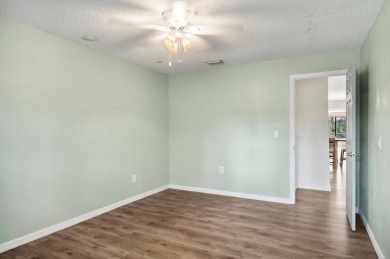 Welcome to your Florida dream home! This stunning 4-bedroom on The Grand Club - Pine Lakes Course in Florida - for sale on GolfHomes.com, golf home, golf lot