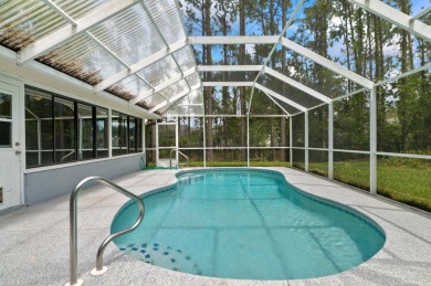 Welcome to your Florida dream home! This stunning 4-bedroom on The Grand Club - Pine Lakes Course in Florida - for sale on GolfHomes.com, golf home, golf lot
