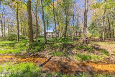 This spacious 4 bedroom, 2.5 bath home has been thoughtfully and on Clearbrook Golf Club in Michigan - for sale on GolfHomes.com, golf home, golf lot