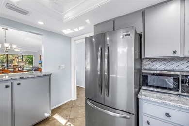 Are you looking for easy Florida living with a great view? This on IMG Academies Golf and Country Club in Florida - for sale on GolfHomes.com, golf home, golf lot