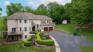 STOP THE CAR! Newly updated home that offers a spectacular lake on Sycamore Creek Golf Club in Missouri - for sale on GolfHomes.com, golf home, golf lot