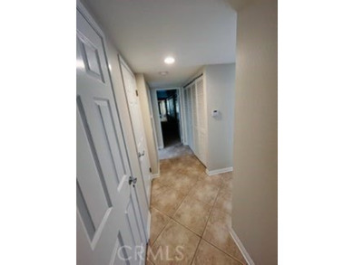 This golf course home is located on the 2nd hole in a gated on Upland Hills Country Club in California - for sale on GolfHomes.com, golf home, golf lot