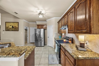 Nestled on a corner lot minutes from beautiful Lake Pat Cleburne on Cleburne Golf Links in Texas - for sale on GolfHomes.com, golf home, golf lot