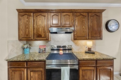 Nestled on a corner lot minutes from beautiful Lake Pat Cleburne on Cleburne Golf Links in Texas - for sale on GolfHomes.com, golf home, golf lot
