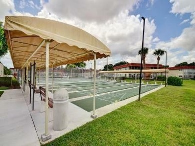 NO AGE RESTRICTION IN THIS BUILDING, WASHER AND DRYER INSIDE on The American Golf Club in Florida - for sale on GolfHomes.com, golf home, golf lot
