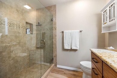 Dramatic lake, fairway and views of the Santa Rosa Mountains on Palm Royale Country Club in California - for sale on GolfHomes.com, golf home, golf lot