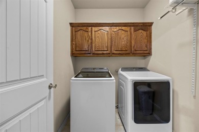 Nestled on a corner lot minutes from beautiful Lake Pat Cleburne on Cleburne Golf Links in Texas - for sale on GolfHomes.com, golf home, golf lot