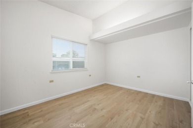 Welcome to this centrally located corner home on expansive on Leisure World Seal Beach Golf Course in California - for sale on GolfHomes.com, golf home, golf lot