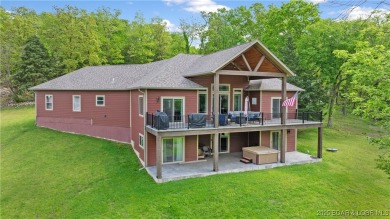 Welcome to this 6-bedroom, 4-full bath home, perfectly on Seasons Ridge At Four Seasons in Missouri - for sale on GolfHomes.com, golf home, golf lot