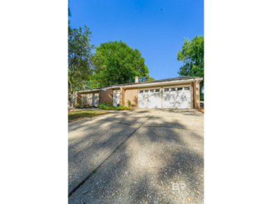 Welcome to your perfect blend of comfort and convenience in the on Lake Forest Yacht and Country Club in Alabama - for sale on GolfHomes.com, golf home, golf lot