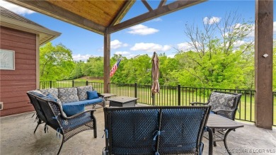 Welcome to this 6-bedroom, 4-full bath home, perfectly on Seasons Ridge At Four Seasons in Missouri - for sale on GolfHomes.com, golf home, golf lot