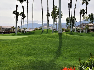 Dramatic lake, fairway and views of the Santa Rosa Mountains on Palm Royale Country Club in California - for sale on GolfHomes.com, golf home, golf lot