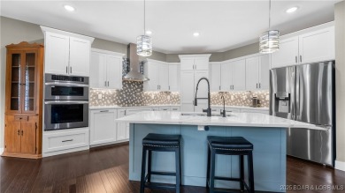 Welcome to this 6-bedroom, 4-full bath home, perfectly on Seasons Ridge At Four Seasons in Missouri - for sale on GolfHomes.com, golf home, golf lot