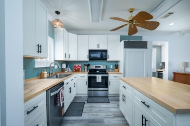 Stunning updated Gulf front unit ready for rental season or on Sandpiper Cove Golf Course in Florida - for sale on GolfHomes.com, golf home, golf lot
