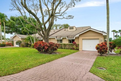Discover the charm of this well-designed 3-bedroom, 2.5-bathroom on Fountains Golf and Country Club in Florida - for sale on GolfHomes.com, golf home, golf lot