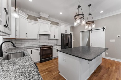 Beautifully crafted 2020 farmhouse-style home in gated Pinewild on Pinewild Country Club of Pinehurst in North Carolina - for sale on GolfHomes.com, golf home, golf lot