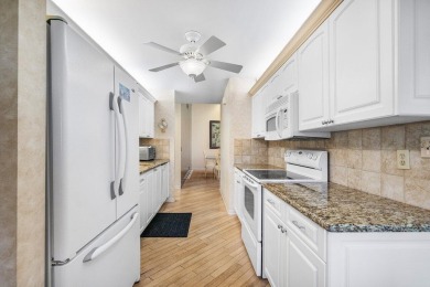 Discover the charm of this well-designed 3-bedroom, 2.5-bathroom on Fountains Golf and Country Club in Florida - for sale on GolfHomes.com, golf home, golf lot