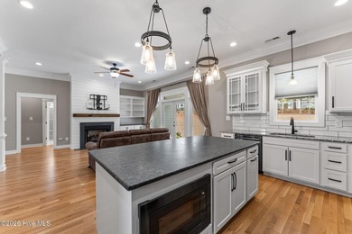 Beautifully crafted 2020 farmhouse-style home in gated Pinewild on Pinewild Country Club of Pinehurst in North Carolina - for sale on GolfHomes.com, golf home, golf lot