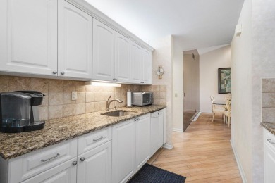 Discover the charm of this well-designed 3-bedroom, 2.5-bathroom on Fountains Golf and Country Club in Florida - for sale on GolfHomes.com, golf home, golf lot