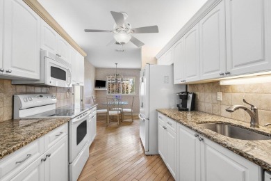 Discover the charm of this well-designed 3-bedroom, 2.5-bathroom on Fountains Golf and Country Club in Florida - for sale on GolfHomes.com, golf home, golf lot