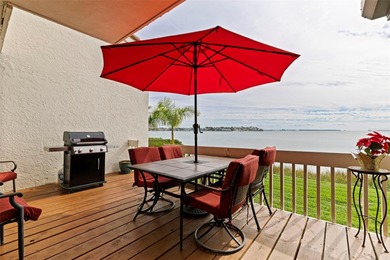 Welcome to waterfront living at Playa Escondida, where you will on Isla Del Sol Yacht and Country Club in Florida - for sale on GolfHomes.com, golf home, golf lot