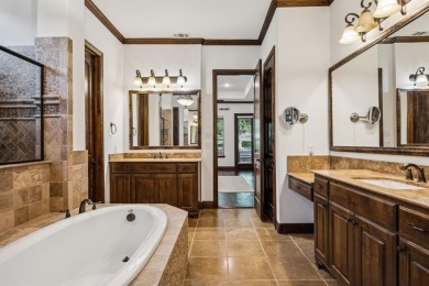Stunning former model home perfectly positioned on the 13th hole on Lantana Golf Club in Texas - for sale on GolfHomes.com, golf home, golf lot